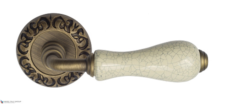 Дверные ручки Venezia COLOSSEO белая керамика паутинка D4 матовая бронза